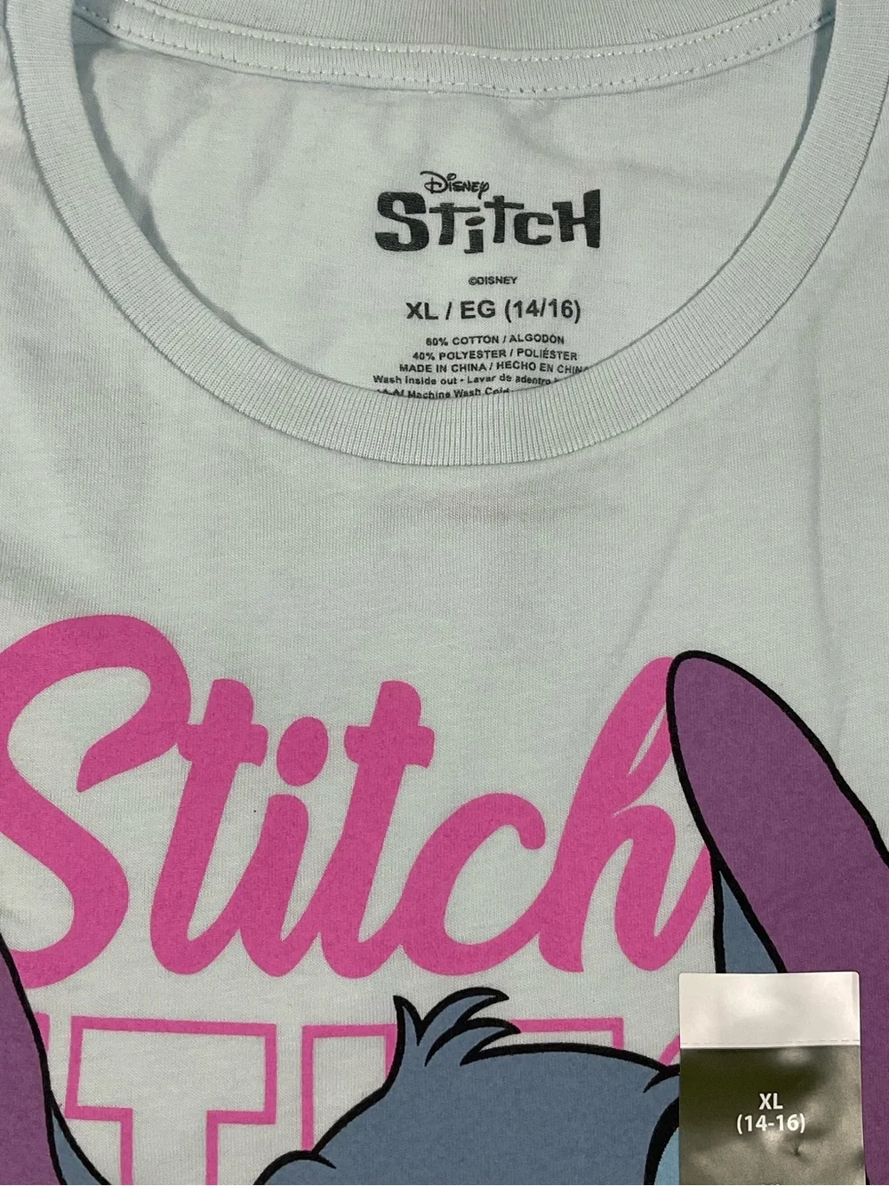 Disney Light Blue Stitch Tee with Pink and Purple. New with Tag.size L(10/12)
